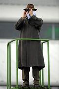 30 December 2010; Racing official Joe Collins looks on during The Bord na Mona Clean Water Maiden Hurdle. Leopardstown Christmas Racing Festival 2010, Leopardstown Racecourse, Leopardstown, Dublin. Picture credit: Barry Cregg / SPORTSFILE