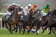 30 December 2010; Horses and jockeys avoid jockey Bryan Cooper, after being unseated by his mount Battling Boru, during The Bord na Mona Clean Water Maiden Hurdle. Leopardstown Christmas Racing Festival 2010, Leopardstown Racecourse, Leopardstown, Dublin. Picture credit: Stephen McCarthy / SPORTSFILE