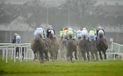 30 December 2010; Hidden Universe, extreme left, with Robbie McNamara up, leads the field around the first bend, in the foggy conditions, first time round during The Bord na Mona Clean Water Maiden Hurdle. Leopardstown Christmas Racing Festival 2010, Leopardstown Racecourse, Leopardstown, Dublin. Picture credit: Barry Cregg / SPORTSFILE