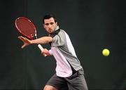 31 December 2010; Lazare Kukhalashvili, BNP Paribas Tennis Ireland Academy, in action against Niall Fitzgerald, Greystones, Co. Wicklow, during the Men's Singles Final. Fitzgerald was forced to retire, due to injury, during the opening set. National Indoor Tennis Championships Finals 2010, David Lloyd Riverview, Clonskeagh, Dublin. Picture credit: Stephen McCarthy / SPORTSFILE