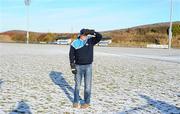 9 January 2011; Dublin manager Pat Gilroy inspects the pitch before the scheduled throw-in. Referee Fergal Kelly subsequently made the decision not to play the game due to the overnight frost. O'Byrne Cup, Westmeath v Dublin, St. Loman's GAA Club, Lakepoint Park, Mullingar, Co. Westmeath. Picture credit: Dáire Brennan / SPORTSFILE