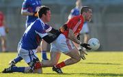 9 January 2011; Ian Jones, Cork, in action against Ross Brady, WIT. McGrath Cup, Cork v Waterford Institute of Technology, Pairc Ui Rinn, Cork. Picture credit: Diarmuid Greene / SPORTSFILE