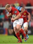 9 September 2016; John Ryan of Munster is tackled by Taufa'ao Filise of Cardiff Blues during the Guinness PRO12 Round 2 match between Munster and Cardiff Blues at Irish Independent Park in Cork. Photo by Piaras Ó Mídheach/Sportsfile