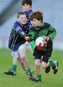 11 January 2011; Jack Gallagher, St. Josephs BNS, in action against David O'Callaghan, St. Pius X BNS. Allianz Cumann na mBunscol Football Finals, Corn na nGearaltach, St. Pius X BNS, Terenure v St. Josephs BNS, Terenure. Croke Park, Dublin. Picture credit: Barry Cregg / SPORTSFILE