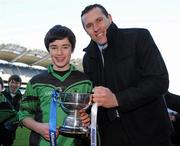 11 January 2011; St. Josephs BNS capatin Jack McVeigh, is presented with Corn na nGearaltach by former Dublin footballer and Allianz Ciaran Whelan. Allianz Cumann na mBunscol Football Finals, Corn na nGearaltach, St. Pius X BNS, Terenure v St. Josephs BNS, Terenure. Croke Park, Dublin. Picture credit: Barry Cregg / SPORTSFILE