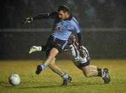 11 January 2011; Kevin McManamon, Dublin, beats Westmeath goalkeeper Darren Quinn to score his side's first goal. O'Byrne Cup, Westmeath v Dublin, St. Loman's GAA Club, Lakepoint Park, Mullingar, Co. Westmeath. Picture credit: David Maher / SPORTSFILE