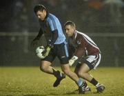 11 January 2011; Kevin McManamon, Dublin, beats Westmeath goalkeeper Darren Quinn to score his side's first goal. O'Byrne Cup, Westmeath v Dublin, St. Loman's GAA Club, Lakepoint Park, Mullingar, Co. Westmeath. Picture credit: David Maher / SPORTSFILE