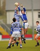 13 January 2011; Padraig McEvoy, Knockbeg College, in action against Conor Meaney, Malahide Community School. Leinster Colleges Senior Football A Championship, Round 1, Knockbeg College v Malahide Community School, Dr. Cullen Park, Carlow. Photo by Sportsfile