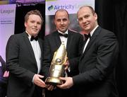 14 January 2010; Sligo Rovers manager Paul Cook, centre, with his Airtricity SWAI Personailty of the Year Award for 2010, with Stephen Wheeler, right, Managing Director, Airtricity, and Daniel McDonnell, President, Soccer Writers Association of Ireland. The Airtricity SWAI Awards 2010, The Conrad Hotel, Dublin. Picture credit: David Maher / SPORTSFILE