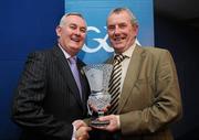 15 January 2011; Retiring Referee Co-ordinator Pierce Freaney receives his award for his long term services by Uachtarán CLG Criostóir Ó Cuana. 2010 National Referees' Awards Banquet, Croke Park, Dublin. Picture credit: Barry Cregg / SPORTSFILE