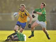 16 January 2011; Kevin Higgins, Roscommon, in action against Conor Sheridan, Leitrim. FBD Connacht League, Roscommon v Leitrim, Elphin GAA Grounds, Elphin, Co. Roscommon. Picture credit: David Maher / SPORTSFILE