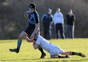 19 January 2011; Fergal Howley, Newpark Comprehensive School, is tackled by Adam Conway, Presentation Bray. Powerade Leinster Schools Rugby Vinnie Murray Cup, 1st Round, Newpark Comprehensive School v Presentation Bray, Old Wesley RFC, Ballycorus, Dublin. Picture credit: Brian Lawless / SPORTSFILE