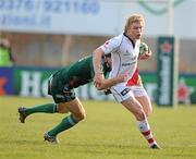 22 January 2011; Nevin Spence, Ulster Rugby, is tackled by Rodd Penney, Aironi Rugby. Heineken Cup Pool 4 Round 6, Aironi Rugby v Ulster, Rugby Stadio Luigi Zaffanella, Aironi, Italy. Picture credit: Oliver McVeigh / SPORTSFILE