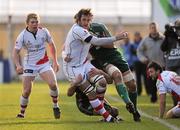 22 January 2011; Pedrie Wannenberg, Ulster Rugby, is tackled by Josh Sole and Jaco Erasmus, Aironi Rugby. Heineken Cup Pool 4 Round 6, Aironi Rugby v Ulster Rugby, Stadio Luigi Zaffanella, Aironi, Italy. Picture credit: Oliver McVeigh / SPORTSFILE