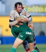 22 January 2011; Pedrie Wannenburg, Ulster Rugby, is tackled by Rodd Penney, Aironi Rugby. Heineken Cup Pool 4 Round 6, Aironi Rugby v Ulster Rugby, Stadio Luigi Zaffanella, Aironi, Italy. Picture credit: Oliver McVeigh / SPORTSFILE