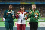 17 September 2016; Gold-medallist Na Mi of China, along with silver-medallist Shirlene Coelho of Brazil, left, and bronze-medallist Noelle Lenihan of Ireland, after the F38 Discus Final at the Olympic Stadium during the Rio 2016 Paralympic Games in Rio de Janeiro, Brazil. Photo by Diarmuid Greene/Sportsfile