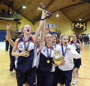 26 January 2011; St. Vincents Secondary School, Cork, players Edel Thornton, 11, and Megan O'Leary celebrate with the cup. Basketball Ireland Girls U16A Schools Cup Final, Calasanctius College, Oranmore, Galway v St. Vincents Secondary School, Cork, National Basketball Arena, Tallaght, Dublin. Picture credit: Stephen McCarthy / SPORTSFILE
