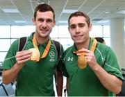 21 September 2016; Michael McKillop and Jason Smyth with their gold medals at the homecoming from the Rio 2016 Paralympic Games at Dublin Airport in Dublin. Photo by Matt Browne/Sportsfile
