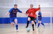 29 January 2011; Yvonne Cahill, UCC, in action against Karen Duggan, UL. Group 1 Qualifier, Womens Soccer Colleges Association of Ireland National Futsal Finals, University of Limerick, Limerick. Picture credit: Diarmuid Greene / SPORTSFILE