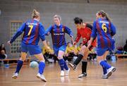 29 January 2011; Zoe Murphy, UCC, in action against Jenny Critchley, left, Lynsey McKey, centre, and Susan Critchley, UL. Group 1 Qualifier, Womens Soccer Colleges Association of Ireland National Futsal Finals, University of Limerick, Limerick. Picture credit: Diarmuid Greene / SPORTSFILE