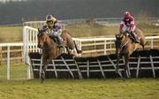 30 January 2011; Square Sphere, left, with Phillip Enright up, jumps the last on their way to winning The Pertemps Handicap Hurdle (Qualifier) ahead of eventual second place Rivage D'Or, with Bryan Cooper up. Horse Racing, Punchestown Racecourse, Punchestown, Co. Kildare. Photo by Sportsfile