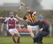 23 January 2011; Canice Maher, Kilkenny, shoots goalwards under pressure from NUI Galway goalkeeper Donal Touhy and corner-back Mark Kelly. Walsh Cup, Kilkenny v NUI Galway, St Patriclk's GAA Club, Ballyragget, Co Kilkenny. Picture credit: Ray McManus / SPORTSFILE
