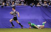 3 February 2011; Seanie O'Loughlin, Terenure College, evades the tackle of Andy O'Reilly, Gonzaga College SJ, on his way to scoring his side's second try, during the first half. Powerade Leinster Schools Rugby Senior Cup, First Round, Terenure College v Gonzaga College SJ, Donnybrook Stadium, Donnybrook, Dublin. Picture credit: Stephen McCarthy / SPORTSFILE