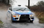 5 February 2011; Derek Mcgarrity and Diarmuid Falvey in their Mitsubishi EVO 10 during SS 2, Shantallow, of the Safety Direct Galway International Rally. Belleville, Monivea, Galway. Picture credit; Barry Cregg / SPORTSFILE