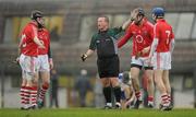 5 February 2011; Referee Michael O'Connor, Limerick, speaks with Cork players. Waterford Crystal Cup Final, Cork v Waterford, Pairc Ui Rinn, Cork. Picture credit: Stephen McCarthy / SPORTSFILE