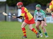 6 February 2011; Aine Mahony, The Harps, in action against Aisling Spellman, Sarsfields. All-Ireland Intermediate Camogie Club Championship Semi-Final, Sarsfields v The Harps, Duggan Park, Ballinasloe, Co. Galway. Picture credit: Brian Lawless / SPORTSFILE