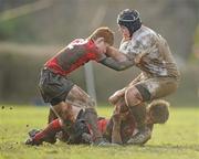 7 February 2011; Conor Pearse, Presentation College Bray, is tackled by James McCusker, left, and Diarmuid O'hUllachain, CUS. Fr Godfrey Cup Quarter-Final Replay, CUS v Presentation College Bray, St. Columba’s College, Whitechurch, Dublin. Picture credit: Stephen McCarthy / SPORTSFILE