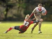 7 February 2011; Michael Burton, Presentation College Bray, is tackled by Stephen Tarpey, CUS. Fr Godfrey Cup Quarter-Final Replay, CUS v Presentation College Bray, St. Columba’s College, Whitechurch, Dublin. Picture credit: Stephen McCarthy / SPORTSFILE