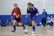 29 January 2011; Rebecca Walsh, DCU, in action against Caitriona O'Leary, UCC. Womens Soccer Colleges Association of Ireland National Futsal Plate Final, University of Limerick, Limerick. Picture credit: Diarmuid Greene / SPORTSFILE