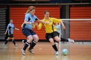 29 January 2011; Ann-Marie Moffatt, NUI Maynooth, in action against Aisling Sealy, UCD. Womens Soccer Colleges Association of Ireland National Futsal Finals, University of Limerick, Limerick. Picture credit: Diarmuid Greene / SPORTSFILE