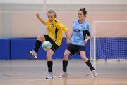 29 January 2011; Megan Brick, NUI Maynooth, in action against Catherine Cronin, UCD. Womens Soccer Colleges Association of Ireland National Futsal Finals, University of Limerick, Limerick. Picture credit: Diarmuid Greene / SPORTSFILE