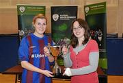 29 January 2011; UL captain Jenny Critchley is presented with the cup by WSCAI Chairperson Aoife Kelliher after victory over IT Sligo. Womens Soccer Colleges Association of Ireland National Futsal Final, University of Limerick, Limerick. Picture credit: Diarmuid Greene / SPORTSFILE