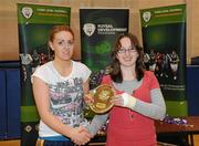 29 January 2011; DCU captain Rebecca Walsh is presented with the plate by WSCAI Chairperson Aoife Kelliher after victory over UCC. Womens Soccer Colleges Association of Ireland National Futsal Plate Final, University of Limerick, Limerick. Picture credit: Diarmuid Greene / SPORTSFILE