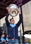 2 October 2016; Dublin captain Stephen Cluxton holds the Sam Maguire cup aloft during the All-Ireland Champions Homecoming at Smithfield Square in Dublin. Photo by Piaras Ó Mídheach/Sportsfile