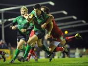 12 February 2011; Frank Murphy, Connacht, on his way to scoring his side's first try, despite the tackle of Daniel Evans, Scarlets. Celtic League, Connacht v Scarlets, Sportsground, Galway. Picture credit: Barry Cregg / SPORTSFILE