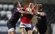 13 February 2011; Ian Humphreys, Ulster, is tackled by Rhys Webb and Jerry Collins, right, Ospreys. Celtic League, Ospreys v Ulster, Liberty Stadium, Swansea, Wales. Picture credit: Steve Pope / SPORTSFILE