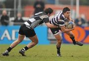 17 February 2011; Ryan Roopnarinsingh, Terenure College, is tackled by Shane Layden, Cistercian College Roscrea. Powerade Leinster Schools Senior Cup Second Round, Terenure College v Cistercian College Roscrea, Donnybrook Stadium, Donnybrook, Dublin. Picture credit: Stephen McCarthy / SPORTSFILE