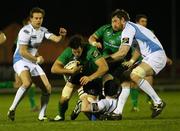 18 February 2011; Mike McCarthy, Connacht, is tackled by Calum Forrester and Aly Muldowney, right, Warriors. Celtic League, Connacht v Warriors, Sportsground, Galway. Picture credit: Aindréas Lynch / SPORTSFILE