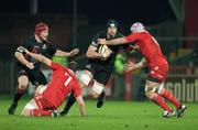 18 February 2011; Fraser McKenzie, Edinburgh, is tackled by Denis Leamy, Munster. Celtic League, Munster v Edinburgh, Thomond Park, Limerick. Picture credit: Ken Sutton / SPORTSFILE