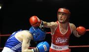 18 February 2011; John Joe Nevin, Cavan, left, exchanges punches with Derek Thorpe, St. Aidan's, during their 56Kg division bout. National Boxing Championships, Semi-Finals, National Stadium, Dublin. Picture credit: Ray Lohan / SPORTSFILE