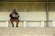 19 February 2011; John Faulkner, from South Kilkenny, looks up the form for todays races before they commence. Horse Racing, Gowran Park, Co. Kilkenny. Picture credit: Barry Cregg / SPORTSFILE