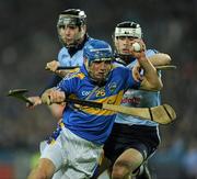 19 February 2011; James Woodlock, Tipperary, in action against Declan O'Dwyer, Dublin. Allianz Hurling League, Division 1 Round 2, Dublin v Tipperary, Croke Park, Dublin. Picture credit: Ray McManus / SPORTSFILE