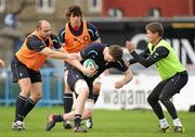 23 February 2011; Ireland's Donnacha Ryan is tackled by Rory Best, Donncha O'Callaghan and Ronan O'Gara during squad training ahead of their RBS Six Nations Rugby Championship match against Scotland on Sunday. Ireland Rugby Squad Training, RDS, Ballsbridge, Dublin. Picture credit: Brendan Moran / SPORTSFILE