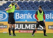 23 February 2011; Ireland's Tommy Bowe struggles with his training bib watched by Tomas O'Leary during squad training ahead of their RBS Six Nations Rugby Championship match against Scotland on Sunday. Ireland Rugby Squad Training, RDS, Ballsbridge, Dublin. Picture credit: Brendan Moran / SPORTSFILE