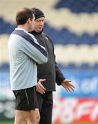 23 February 2011; Ireland head coach Declan Kidney in conversation with referee Alain Rolland during squad training ahead of their RBS Six Nations Rugby Championship match against Scotland on Sunday. Ireland Rugby Squad Training, RDS, Ballsbridge, Dublin. Picture credit: Brendan Moran / SPORTSFILE