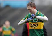 20 February 2011; Kerry's Colm Cooper takes his gloves off after the match. Allianz Football League, Division 1 Round 2, Mayo v Kerry, McHale Park, Castlebar, Co. Mayo. Picture credit: Brian Lawless / SPORTSFILE